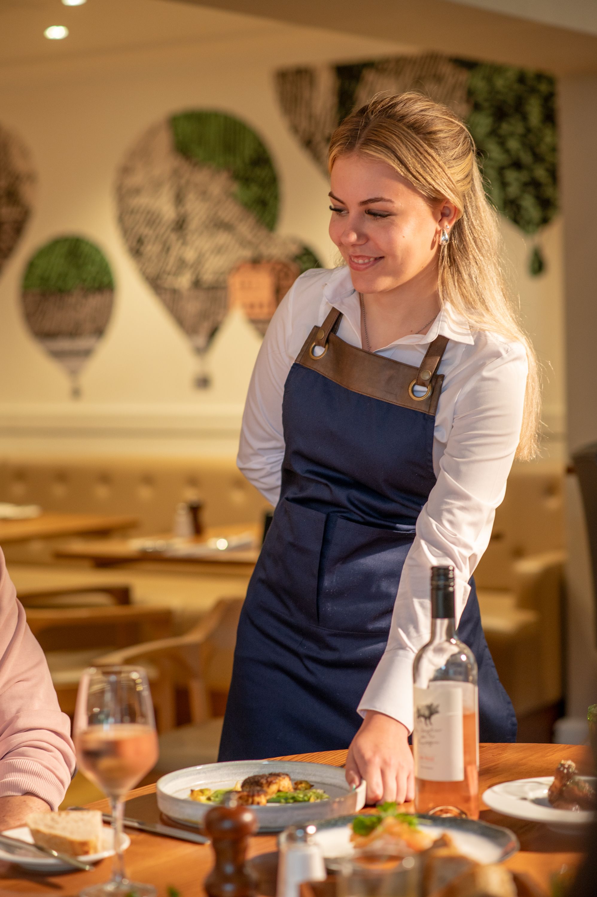 A waitress serving food