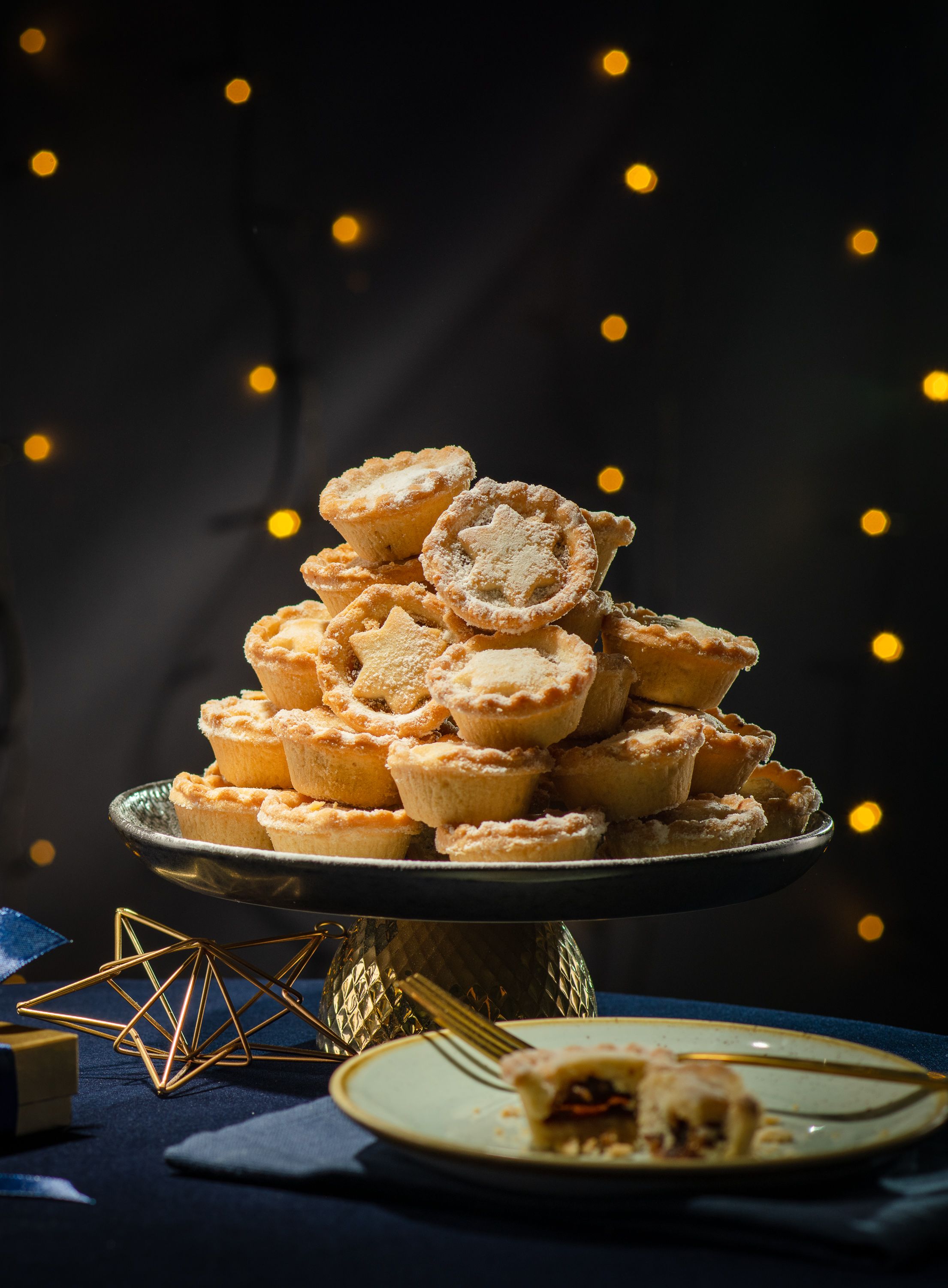 A mince pie pyramid arranged on a dish